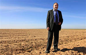 Israel’s new foreign minister, Avigdor Lieberman, stands in a field just outside the Gaza Strip. Lieberman’s right-wing Yisrael Beiteinu Party had an impressive showing in Israel’s recent election, campaigning with the slogan “Without loyalty, there is no citizenship.”