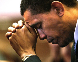 Barack Obama prays during services at Trinity United Church of Christ in Chicago in this 2004 photo. Obama resigned his 20-year membership in Trinity after controversial remarks by his longtime pastor the Rev. Jeremiah Wright threatened to derail his presidential candidacy.