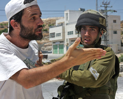 Kobi Snitz: "Even ten Israelis at a demonstration can make a real difference. We know from the army's own declarations that their open fire regulations change as soon as they think there are Israelis around."